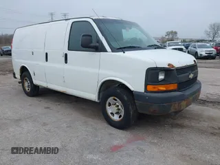 2011 Chevrolet Express Cargo Van with VIN 1GCWGFFA7B1108976, listed as a IAAI auction lot 40937070 with 296,821 mi miles. Bid and sale history available at carsss.com. Image 1.