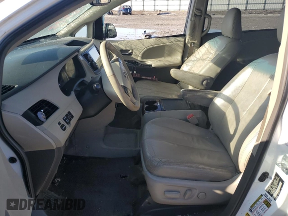 2012 Toyota Sienna XLE AAS with VIN 5TDYK3DC2CS243832, listed as a Copart auction lot 46677115 with 253,252 mi miles and Salvage Title. Bid and sale history available at DreamBid. Image 7.
