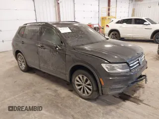 2019 Volkswagen Tiguan S with VIN 3VV0B7AX3KM182311, listed as a IAAI auction lot 41727114 with 98,035 mi miles and . Bid and sale history available at DreamBid. Image 1.