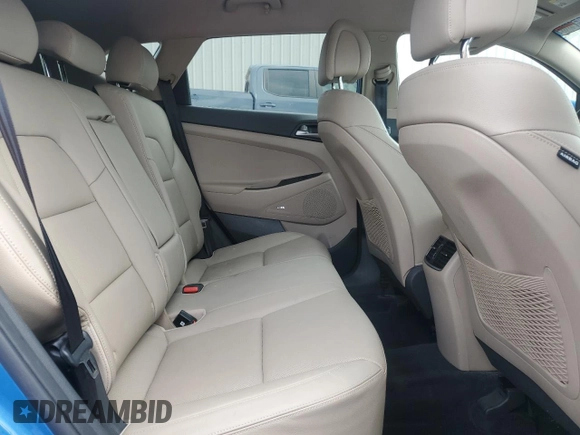 2018 Hyundai Tucson SEL z VIN KM8J3CA42JU793046, wystawiony jako Copart lot #54125905 z przebiegiem 28 370 mil mil oraz Szkoda całkowita • Salvage title. Historia ofert i sprzedaży dostępna na DreamBid. Obrazek 10.