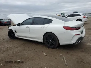 2022 BMW 8 Series 840i with VIN WBAGV4C01NCJ30083, listed as a Copart auction lot 81356084 with 61,868 mi miles and Salvage title. Bid and sale history available at DreamBid. Image 2.