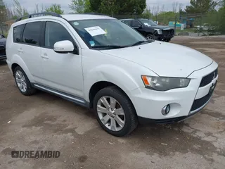 2011 Mitsubishi Outlander SE z VIN JA4JT3AWXBU042813, wystawiony jako IAAI lot #42260431 z przebiegiem 191 006 mil mil oraz . Historia ofert i sprzedaży dostępna na DreamBid. Obrazek 1.