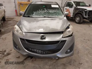 2012 Mazda 5 Touring z VIN JM1CW2CL1C0107706, wystawiony jako IAAI lot #41551479 z przebiegiem 123 418 mil mil oraz . Historia ofert i sprzedaży dostępna na DreamBid. Obrazek 6.