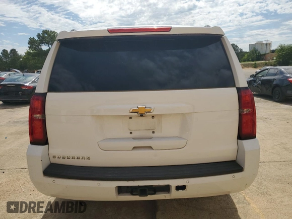 2015 Chevrolet Suburban LT with VIN 1GNSCJKC9FR541167, listed as a Copart auction lot 57051725 with Not provided miles and Salvage title. Bid and sale history available at DreamBid. Image 6.