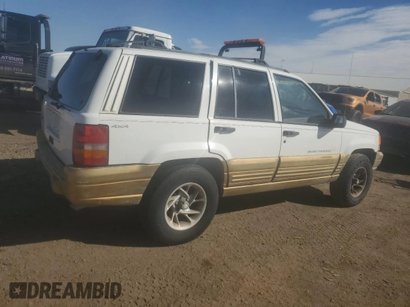 1998 Jeep Grand Cherokee Laredo with VIN 1J4GZ58S9WC361042, listed as a Copart auction lot 46802365 with 236,923 mi miles and Salvage Title. Bid and sale history available at carsss.com. Image 3.