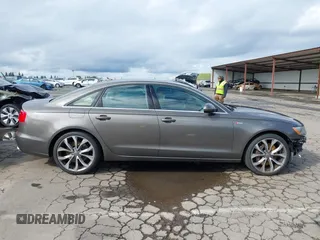 2013 Audi A6 Premium Plus z VIN WAUGGAFC8DN077982, wystawiony jako IAAI lot #41783832 z przebiegiem 95 981 mil mil oraz . Historia ofert i sprzedaży dostępna na DreamBid. Obrazek 14.