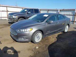 2013 Ford Fusion SE Hybrid with VIN 3FA6P0LU6DR326269, listed as a IAAI auction lot 41999417 with 277,891 mi miles. Bid and sale history available at carsss.com. Image 2.