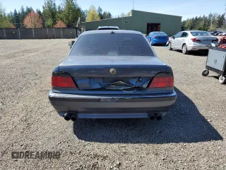 2001 BMW 7 Series 740iL with VIN WBAGH83401DP20569, listed as a Copart auction lot 52725335 with 152,575 mi miles and Salvage Title. Bid and sale history available at carsss.com. Image 6.