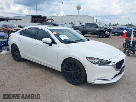 2018 Mazda 6 Grand Touring Reserve with VIN JM1GL1WY1J1321517, listed as a IAAI auction lot 39411226 with 50,280 mi miles and . Bid and sale history available at DreamBid. Image 1.
