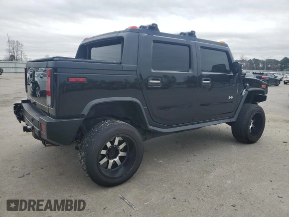 2005 Hummer H2 SUT z VIN 5GRGN22UX5H120312, wystawiony jako Copart lot #43948955 z przebiegiem Nie podano mil oraz Szkoda całkowita • Salvage title. Historia ofert i sprzedaży dostępna na DreamBid. Obrazek 3.