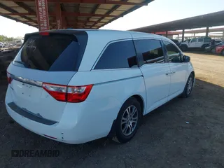 2012 Honda Odyssey EX-L with VIN 5FNRL5H67CB051764, listed as a IAAI auction lot 42493181 with 167,189 mi miles and . Bid and sale history available at DreamBid. Image 4.