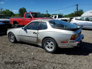 1986 Porsche 944 z VIN WP0AA0954GN155776, wystawiony jako Copart lot #56032785 z przebiegiem 17 696 mil mil oraz Szkoda całkowita • Salvage title. Historia ofert i sprzedaży dostępna na DreamBid. Obrazek 2.