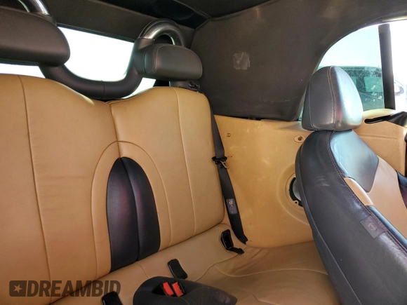 2005 MINI Convertible S with VIN WMWRH33535TF84456, listed as a Copart auction lot 50120725 with 149,840 mi miles and Salvage Title. Bid and sale history available at DreamBid. Image 11.