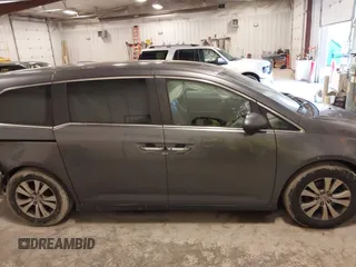 2014 Honda Odyssey EX-L with VIN 5FNRL5H67EB056983, listed as a IAAI auction lot 42318699 with 256,267 mi miles and . Bid and sale history available at DreamBid. Image 13.