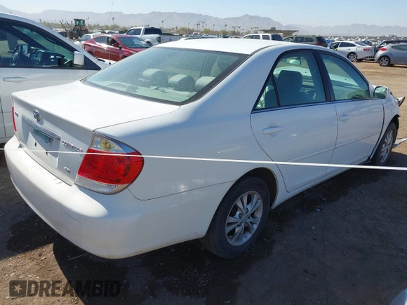 2006 Toyota Camry LE z VIN 4T1BF32K46U634951, wystawiony jako IAAI lot #41679560 z przebiegiem 213 573 mil mil oraz . Historia ofert i sprzedaży dostępna na DreamBid. Obrazek 4.