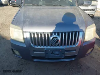 2008 Mercury Mariner with VIN 4M2CU81178KJ06737, listed as a IAAI auction lot 41638001 with 143,895 mi miles. Bid and sale history available at carsss.com. Image 6.
