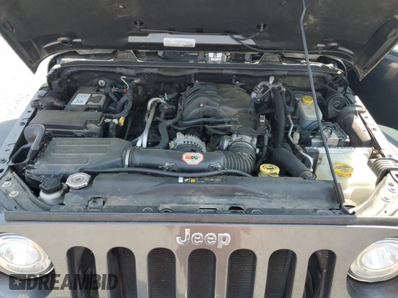 2017 Jeep Wrangler Rubicon with VIN 1C4BJWCG0HL675472, listed as a Copart auction lot 62751365 with 86,338 mi miles and Salvage title. Bid and sale history available at DreamBid. Image 12.