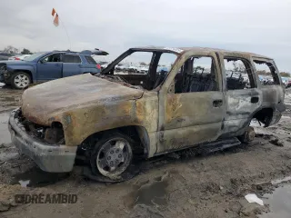 2003 Chevrolet Tahoe LS z VIN 1GNEC13T23J285248, wystawiony jako Copart lot #82634824 z przebiegiem Nie podano mil oraz Nie do naprawy • Non repairable. Historia ofert i sprzedaży dostępna na DreamBid. Obrazek 1.