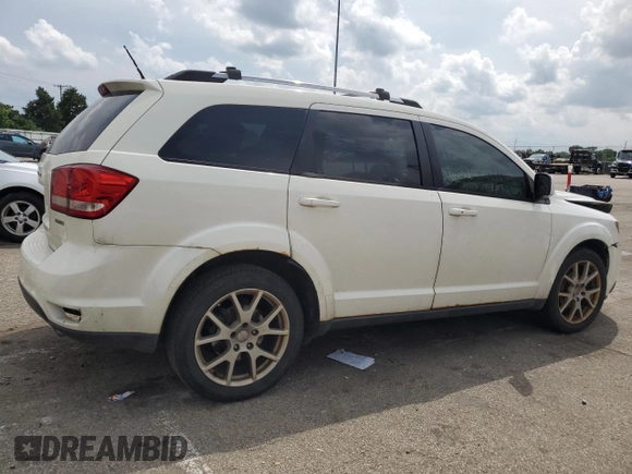 2012 Dodge Journey SXT with VIN 3C4PDCCG4CT243492, listed as a Copart auction lot 59908485 with 319,175 mi miles and Salvage title. Bid and sale history available at DreamBid. Image 3.