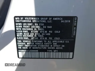 2018 Volkswagen Atlas SEL with VIN 1V2RR2CA1JC566065, listed as a IAAI auction lot 41687434 with 77,795 mi miles and . Bid and sale history available at DreamBid. Image 9.