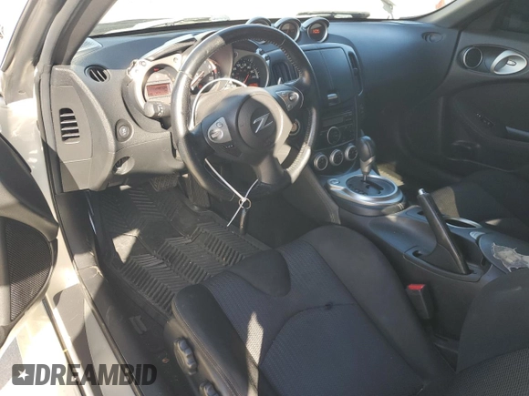 2014 Nissan 370Z Nismo with VIN JN1AZ4EH0EM635111, listed as a Copart auction lot 87292134 with 185,356 mi miles and Salvage Title. Bid and sale history available at DreamBid. Image 8.
