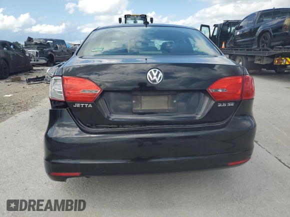 2012 Volkswagen Jetta SE with VIN 3VWDX7AJ3CM338441, listed as a Copart auction lot 60853055 with 151,075 mi miles and Salvage title. Bid and sale history available at DreamBid. Image 6.