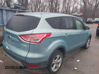 2013 Ford Escape SE with VIN 1FMCU0GX3DUA53807, listed as a IAAI auction lot 41510813 with 167,150 mi miles and . Bid and sale history available at DreamBid. Image 4.