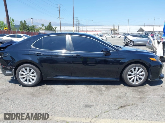 2020 Toyota Camry LE with VIN 4T1C11AKXLU955851, listed as a IAAI auction lot 41996827 with 59,008 mi miles and . Bid and sale history available at carsss.com. Image 14.