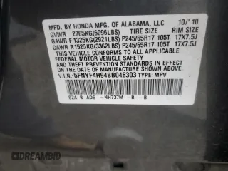 2011 Honda Pilot Touring z VIN 5FNYF4H94BB046303, wystawiony jako Copart lot #58017515 z przebiegiem 118 384 mil mil oraz Szkoda całkowita • Salvage title. Historia ofert i sprzedaży dostępna na DreamBid. Obrazek 14.