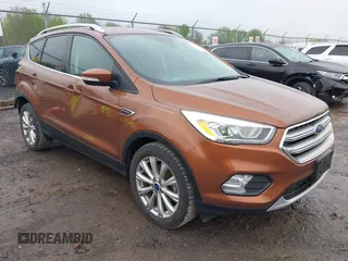 2017 Ford Escape Titanium with VIN 1FMCU0JD3HUB20846, listed as a IAAI auction lot 42182260 with 28,610 mi miles and . Bid and sale history available at DreamBid. Image 1.