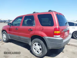 2003 Ford Escape XLT Popular 2 with VIN 1FMYU93123KB02310, listed as a IAAI auction lot 41975073 with 169,864 mi miles. Bid and sale history available at carsss.com. Image 3.
