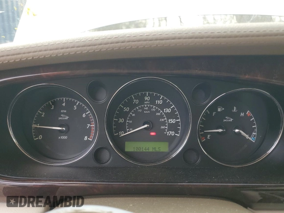 2004 Jaguar XJ with VIN SAJEA74C64SG08121, listed as a Copart auction lot 81736984 with 100,144 mi miles and Non Repairable. Bid and sale history available at DreamBid. Image 9.