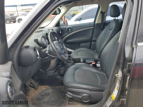 2013 MINI Cooper Countryman with VIN WMWZB3C56DWM08030, listed as a Copart auction lot 50261555 with 91,111 mi miles and Salvage Title. Bid and sale history available at carsss.com. Image 7.
