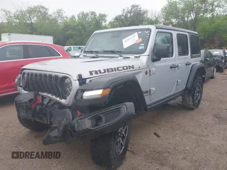 2024 Jeep Wrangler Rubicon with VIN 1C4PJXFG7RW252959, listed as a IAAI auction lot 41955302 with 27,727 mi miles and . Bid and sale history available at DreamBid. Image 17.