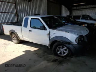 2002 Nissan Frontier XE with VIN 1N6DD26S02C309301, listed as a Copart auction lot 64142805 with 237,523 mi miles and Salvage title. Bid and sale history available at DreamBid. Image 4.