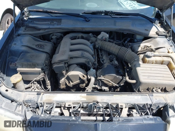 2005 Chrysler 300 with VIN 2C3JA43R65H668010, listed as a IAAI auction lot 41976405 with 216,099 mi miles. Bid and sale history available at carsss.com. Image 10.