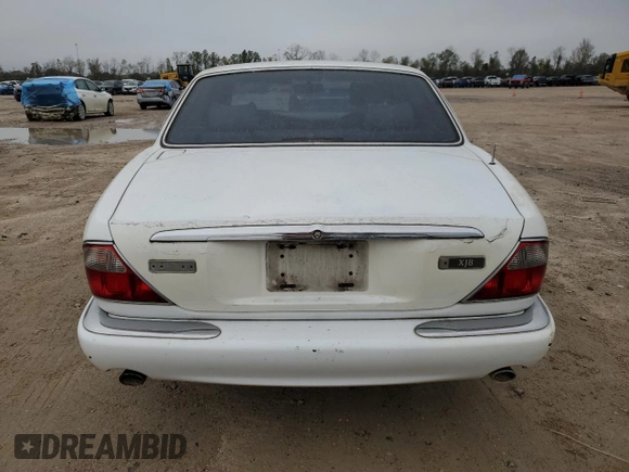 1998 Jaguar XJ with VIN SAJHX1248WC835728, listed as a Copart auction lot 86698244 with 116,768 mi miles and Clean title. Bid and sale history available at DreamBid. Image 6.