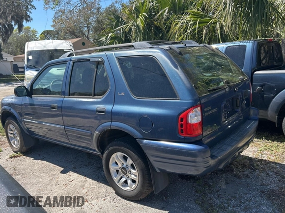 2002 Isuzu Rodeo S z VIN 4S2CK58W124324362, wystawiony jako Copart lot #49668045 z przebiegiem Nie podano mil oraz Czysty tytuł • Clean title. Historia ofert i sprzedaży dostępna na DreamBid. Obrazek 3.