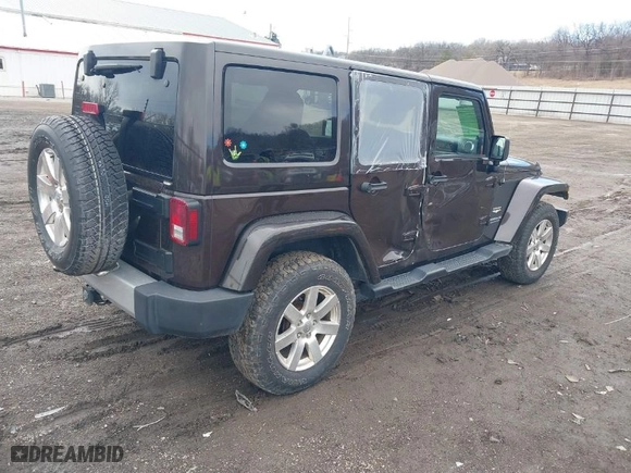 2013 Jeep Wrangler Unlimited Sahara with VIN 1C4BJWEG9DL686090, listed as a IAAI auction lot 41684264 with 126,000 mi miles. Bid and sale history available at carsss.com. Image 4.