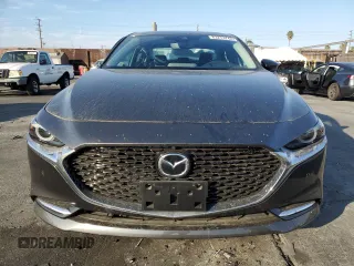 2023 Mazda 3 Premium Plus with VIN 3MZBPBEY2PM377464, listed as a Copart auction lot 83273744 with 6,299 mi miles and Salvage Title. Bid and sale history available at DreamBid. Image 4.