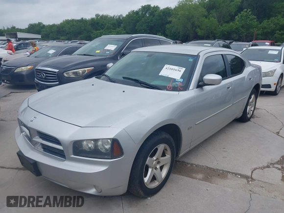 2010 Dodge Charger SXT with VIN 2B3CA3CV2AH227658, listed as a IAAI auction lot 42101656 with 162,392 mi miles. Bid and sale history available at carsss.com. Image 2.