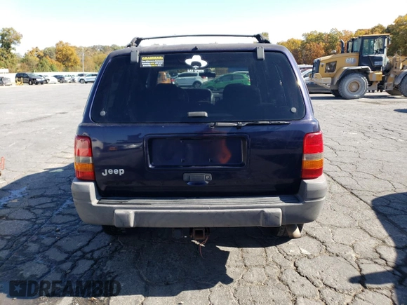 1998 Jeep Grand Cherokee Laredo with VIN 1J4GZ58S8WC167716, listed as a Copart auction lot 76477694 with 167,519 mi miles and Salvage Title. Bid and sale history available at carsss.com. Image 6.