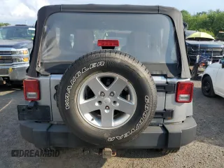 2013 Jeep Wrangler Sport with VIN 1C4AJWAG7DL635639, listed as a Copart auction lot 67182975 with 101,576 mi miles and Clean title. Bid and sale history available at DreamBid. Image 6.