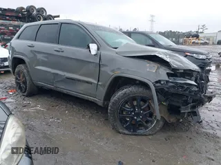 2021 Jeep Grand Cherokee Laredo X with VIN 1C4RJFAG9MC590268, listed as a IAAI auction lot 41614514 with 60,933 mi miles and . Bid and sale history available at DreamBid. Image 1.