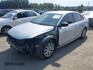 2015 Volkswagen Jetta Sport with VIN 3VWD17AJ0FM271660, listed as a IAAI auction lot 42527496 with 115,008 mi miles and . Bid and sale history available at DreamBid. Image 2.