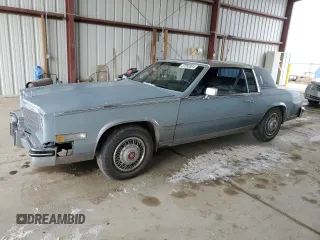 1982 Cadillac Eldorado z VIN 1G6AL5789CE603351, wystawiony jako Copart lot #37082804 z przebiegiem 86 118 mil mil oraz Tytuł czysty. Historia ofert i sprzedaży dostępna na DreamBid. Obrazek 1.