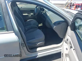 2003 Ford Taurus SE Standard with VIN 1FAFP53UX3G268265, listed as a IAAI auction lot 42090151 with 139,734 mi miles. Bid and sale history available at carsss.com. Image 5.
