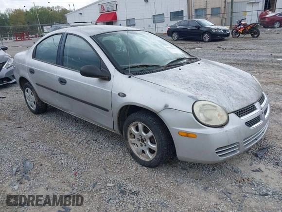2005 Dodge Neon SE with VIN 1B3ES26C35D205066, listed as a IAAI auction lot 41943955 with 129,821 mi miles. Bid and sale history available at carsss.com. Image 1.
