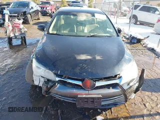 2017 Toyota Camry Hybrid LE with VIN 4T1BD1FK9HU203089, listed as a IAAI auction lot 41315779 with 87,630 mi miles. Bid and sale history available at carsss.com. Image 12.