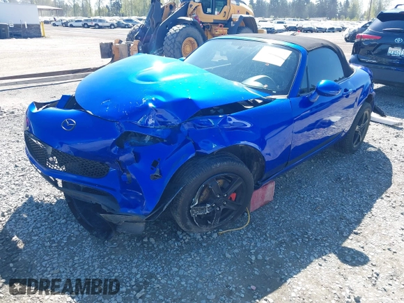 2006 Mazda MX-5 Miata Touring z VIN JM1NC25F560104482, wystawiony jako IAAI lot #42045035 z przebiegiem 131 892 mil mil oraz . Historia ofert i sprzedaży dostępna na DreamBid. Obrazek 2.